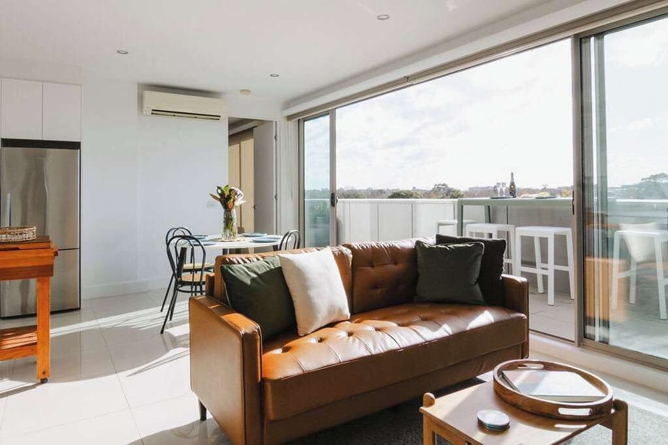 Our cosy living area invites you to relax and enjoy your favorite shows on the sleek TV.