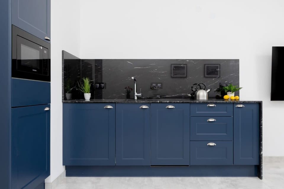 The fully equipped kitchenette includes everything you need for a home-cooked meal.