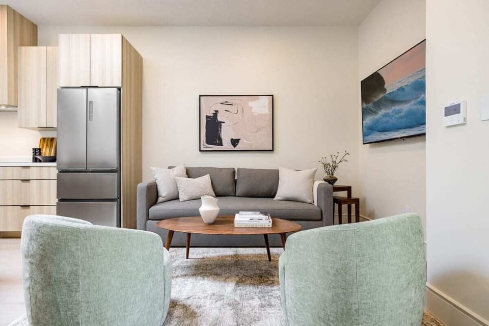 Seating area with sofa and lounge chairs