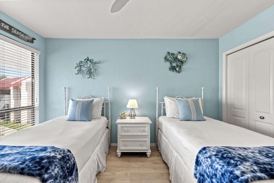 Sleep Easy Under the Island Breeze – Spacious Second Bedroom with Smart TV