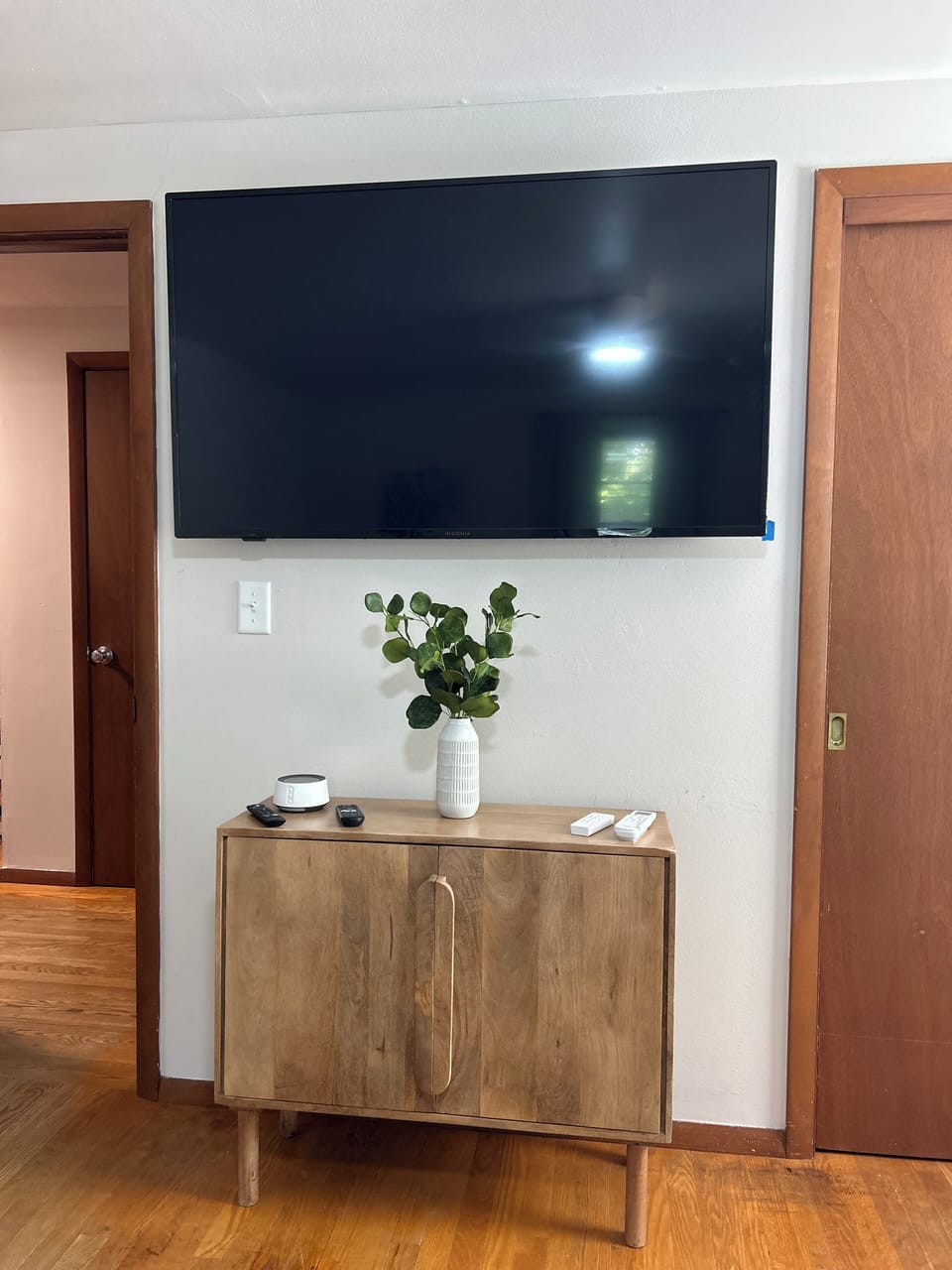 Second Bedroom dresser and 55" Smart TV. 
