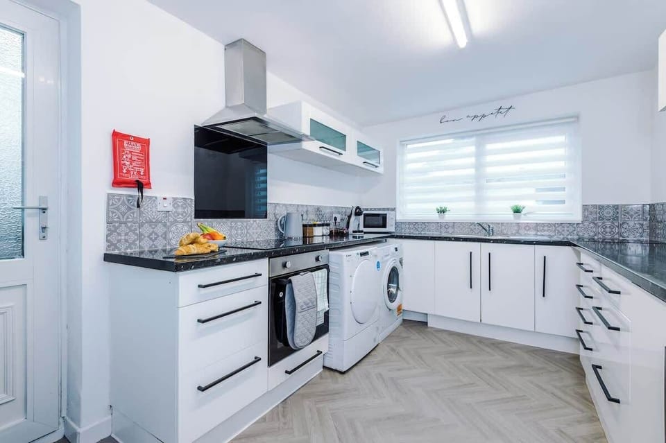The fully equipped kitchen has everything you need for a long or short stay in Manchester.