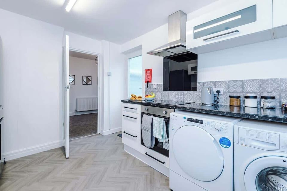 The fully equipped kitchen has everything you need for a long or short stay in Manchester.