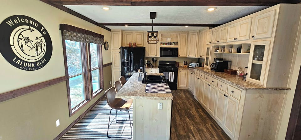 Kitchen w/coffee pods, coffee maker, practically everything you need for cooking