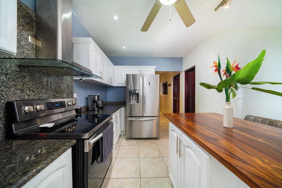 Newly updated kitchen with full size refrigerator, oven/stove & microwave