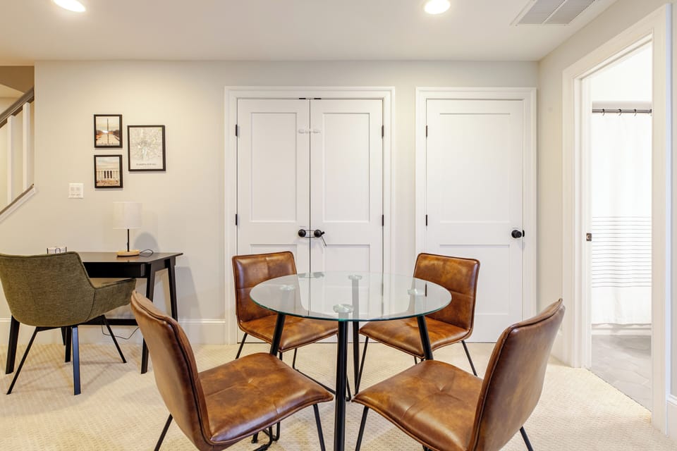 Dining area with workspace in background