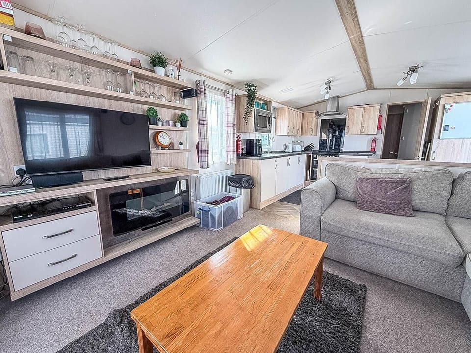 Escape to Park Holidays Broadland Sands for a dog friendly weekend break, where you can relax in the living room in a caravan after exploring Corton Beach Lowestoft and other Suffolk beaches.