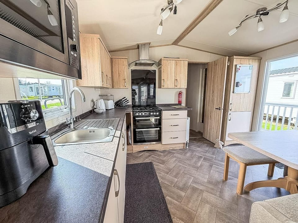Explore the beauty of Lowestoft Suffolk while enjoying dog friendly caravan holidays at Broadland Sands Holiday Park Lowestoft, complete with a modern kitchen area in a caravan for all your needs.