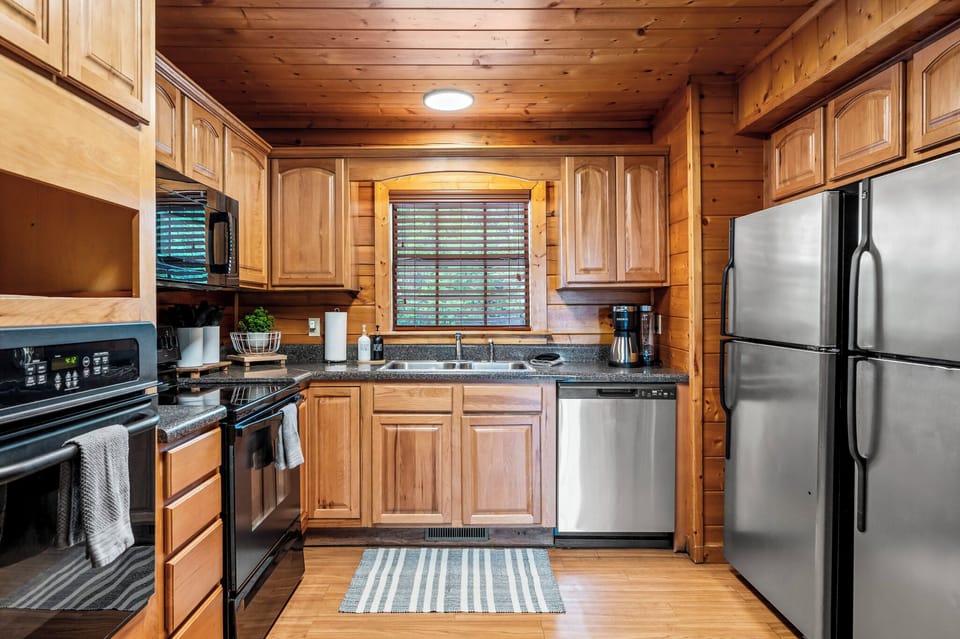 Fully Stocked Kitchen with Double Refrigerators and Ovens