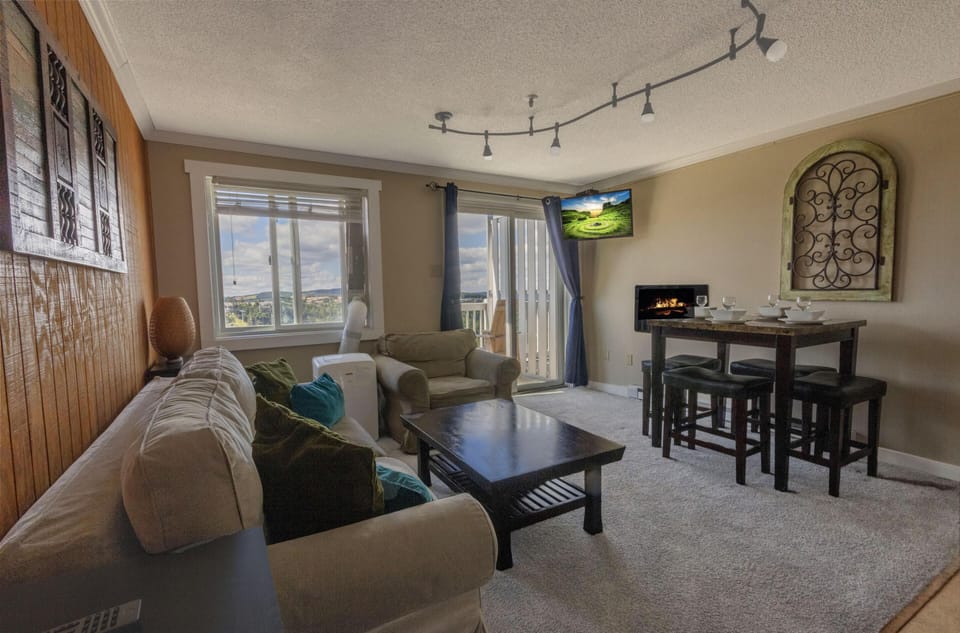 Kick back and relax in the living room, your comfortable haven after a day of mountain fun.