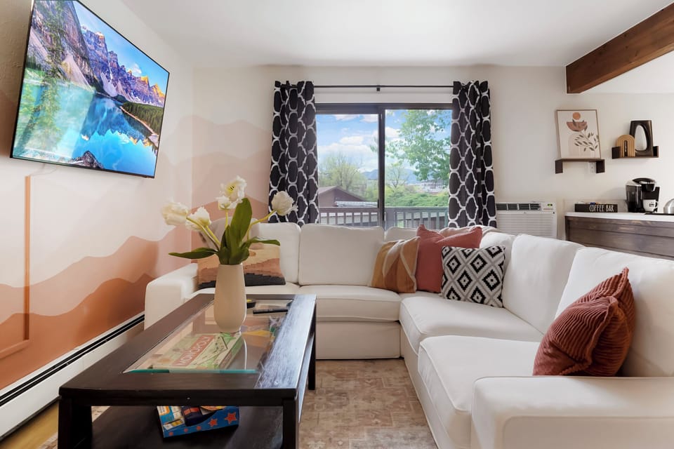 Open living, kitchen and dining area.