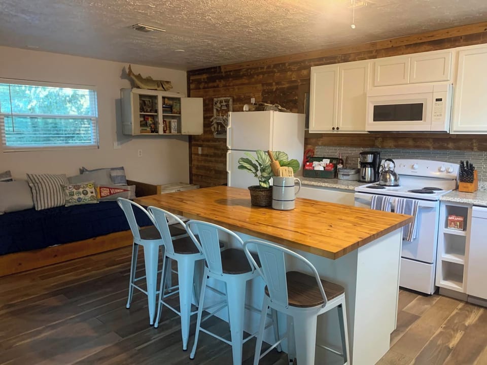 Kitchen with dining island.