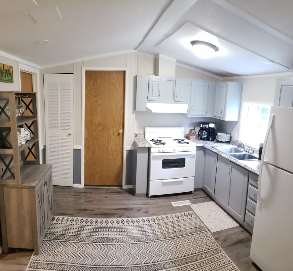 Fully loaded kitchen for cooking, grilling, and serving your group.