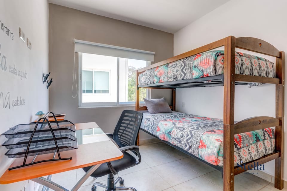 There's an office desk and chair for working or studying if needed