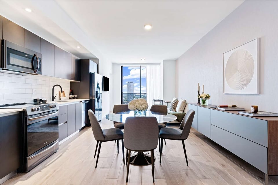 Gather for meals and conversation in a bright open-plan space.