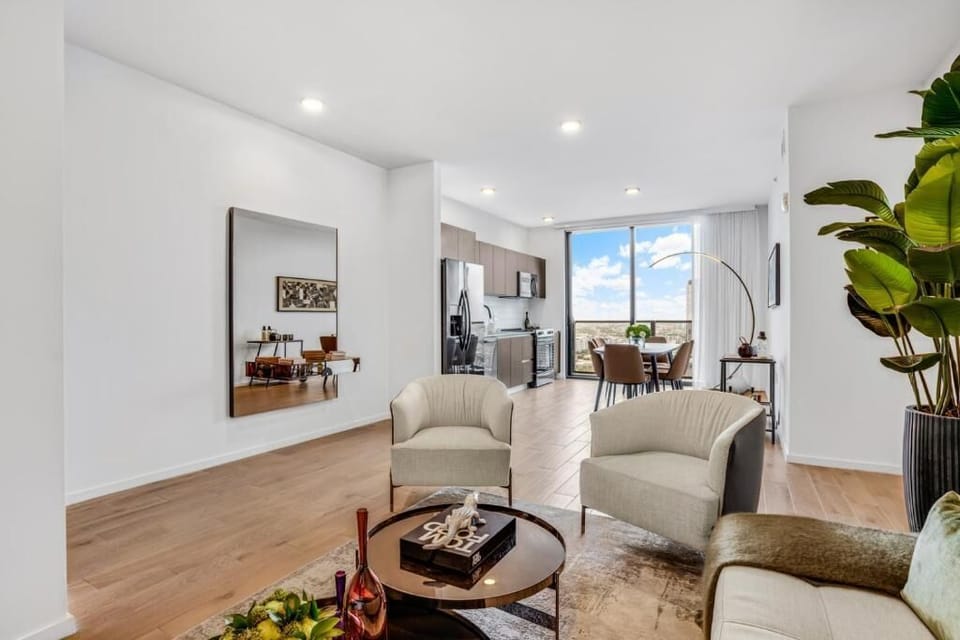 Gather effortlessly in the airy open-plan living and dining space.