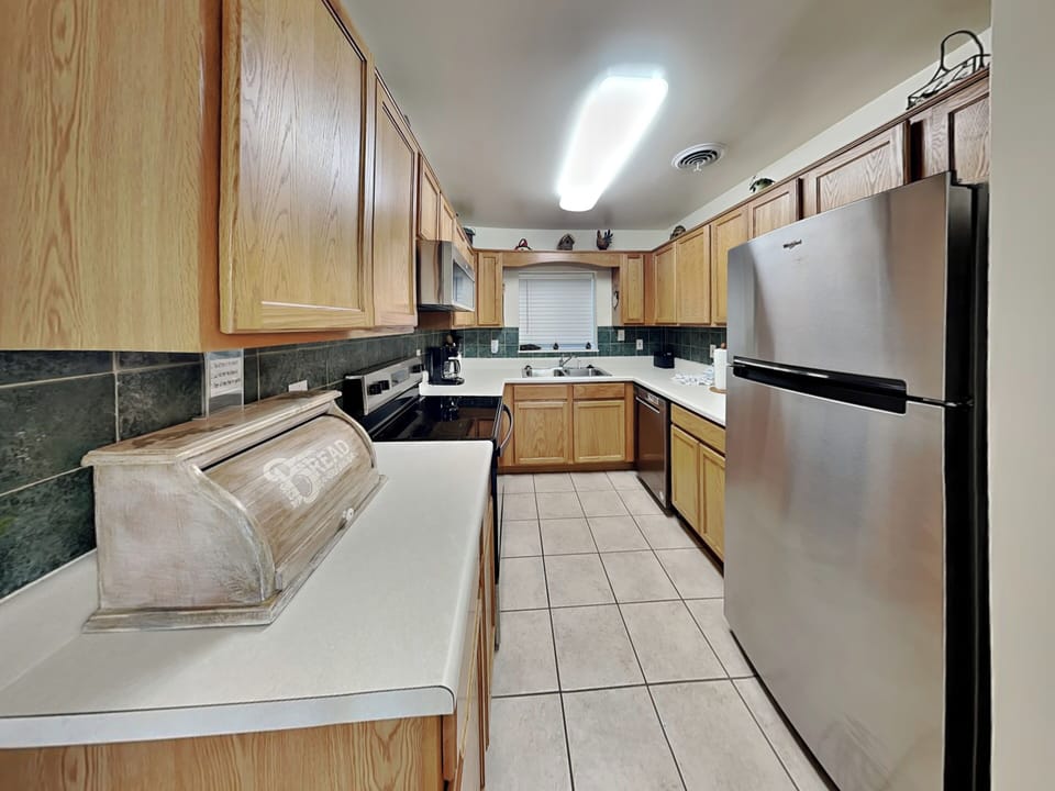 Fully Equipped Kitchen with New Stainless Steel Appliances