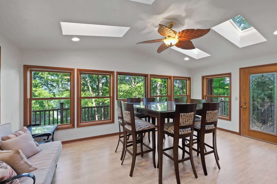 Plenty of windows enable guest to view the outdoor deck and waterfront
