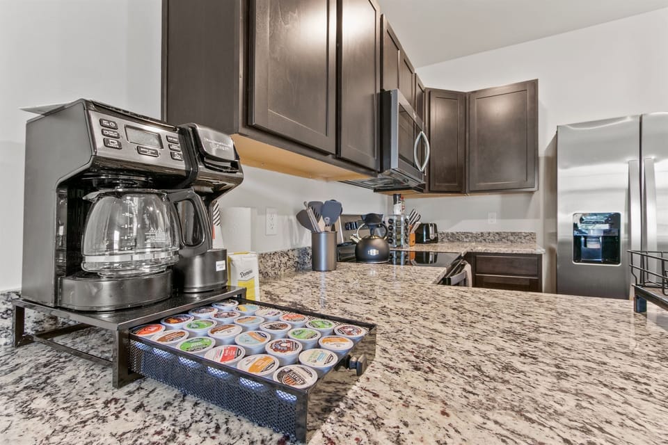 Kitchen: Brew your favorite blends with our stylish K-Pod coffee station! Perfect for coffee lovers!