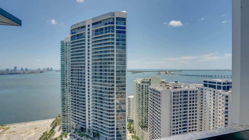 Balcony offers breathtaking views of both the cityscape and the waterfront.
