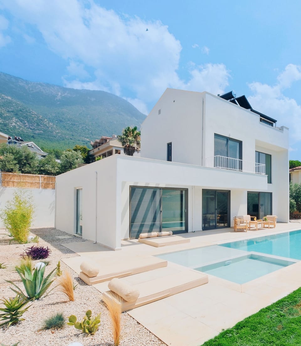 Villa Neo with 2 pool, spacious living areas, and fully equipped kitchen