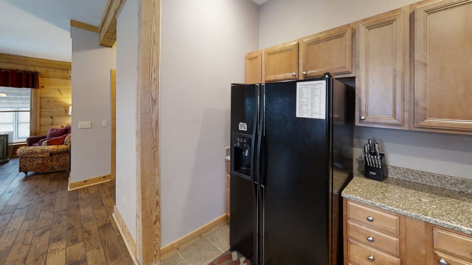 Indoors, Refrigerator, Floor, Flooring, Hardwood