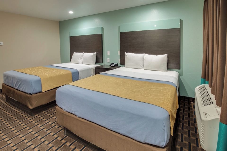 Unwind in crisp linens with spacious, bright double beds.