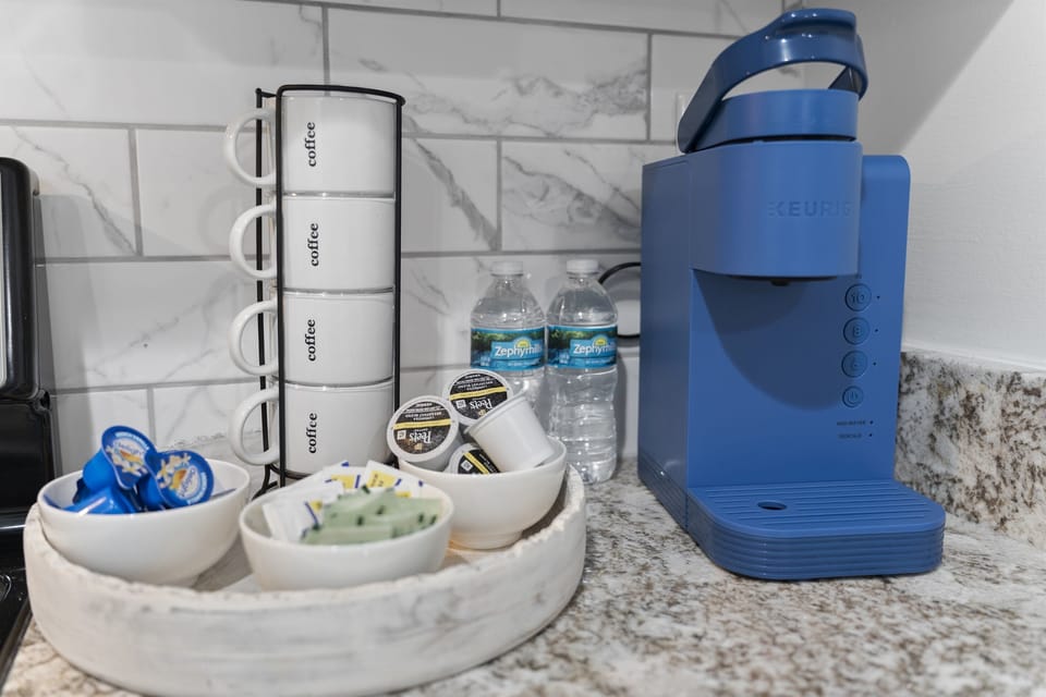 Start your day with fresh coffee from the fully stocked coffee station.