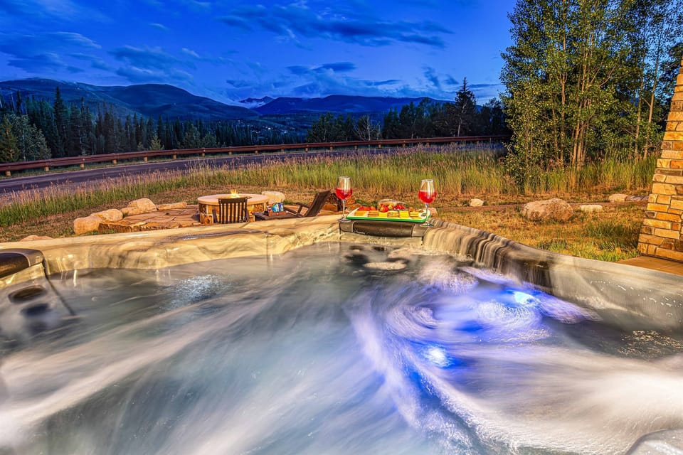 Oversize hot tub with mountain views