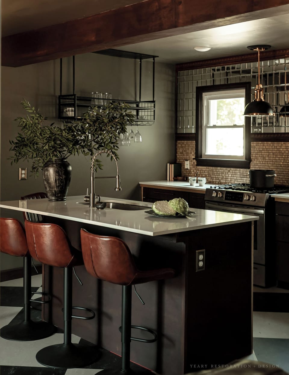 Full kitchen with mid size fridge/freezer, gas stove/oven, and kitchen island!