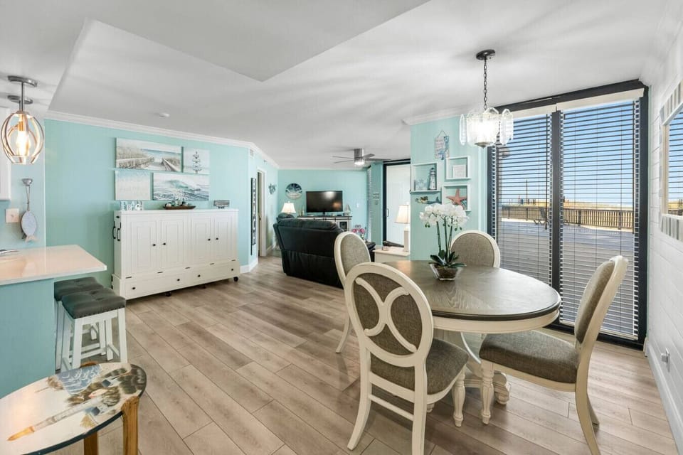 Cozy Dining Area with Ocean Views and Murphy Bed