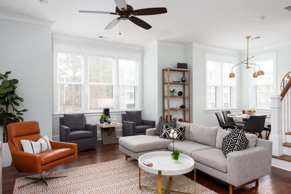 Contemporary living space featuring stylish décor and cozy, inviting seating.