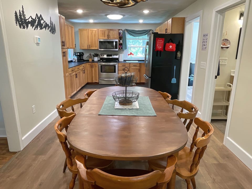 Fully stocked Kitchen open to dining table. Seats 8!