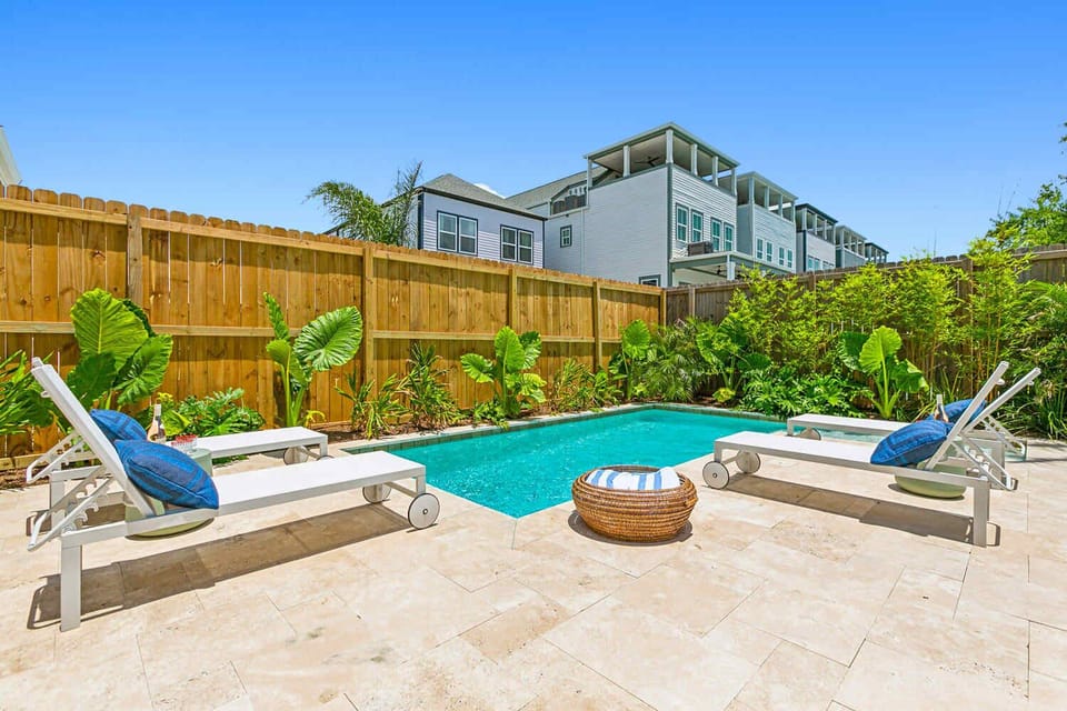 back yard pool + loungers