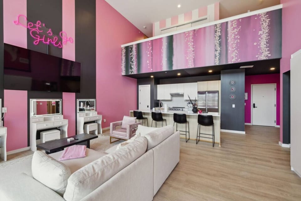 Spacious open-concept loft with bold glam vibes, Smart TV, full kitchen + bar seating, and 3 makeup vanities with LED lighting—perfect for getting ready and starting the night in true Nashville style!