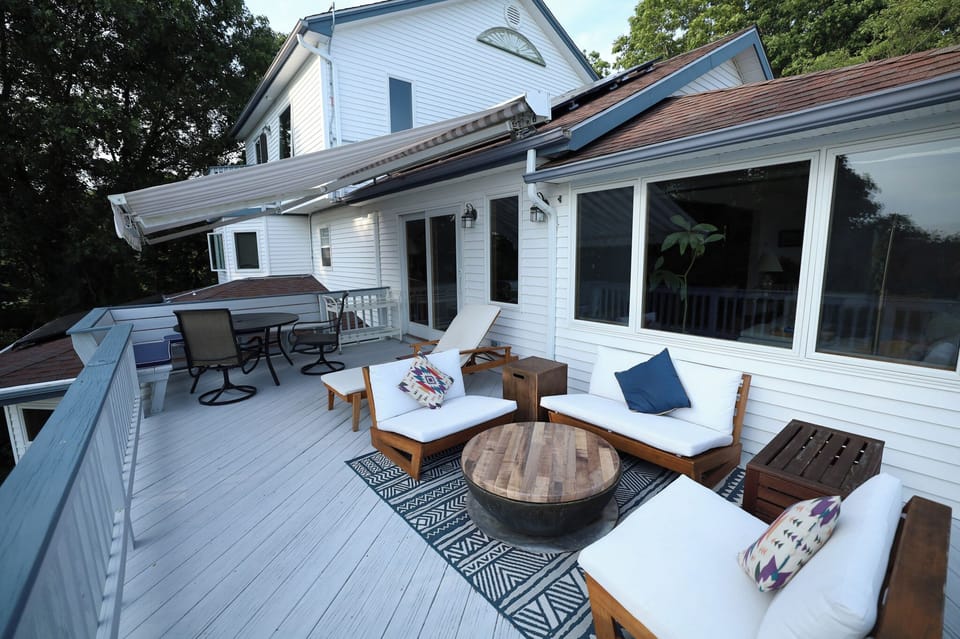 Large Deck w/multiple seating areas, adjustable awning & propane fire pit