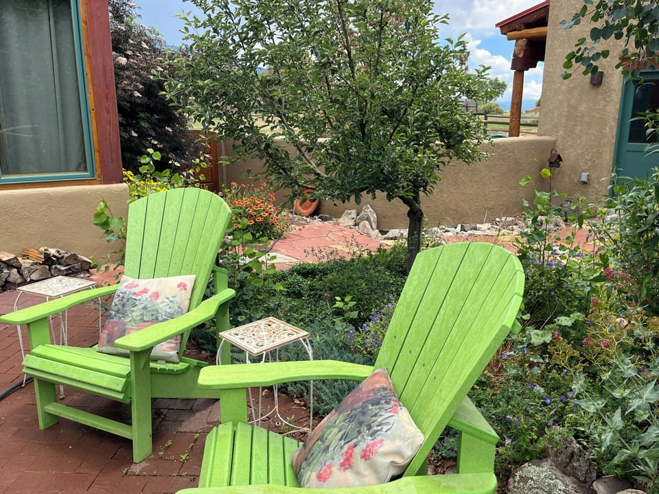 Adirondack lounge chairs in the garden courtyard.