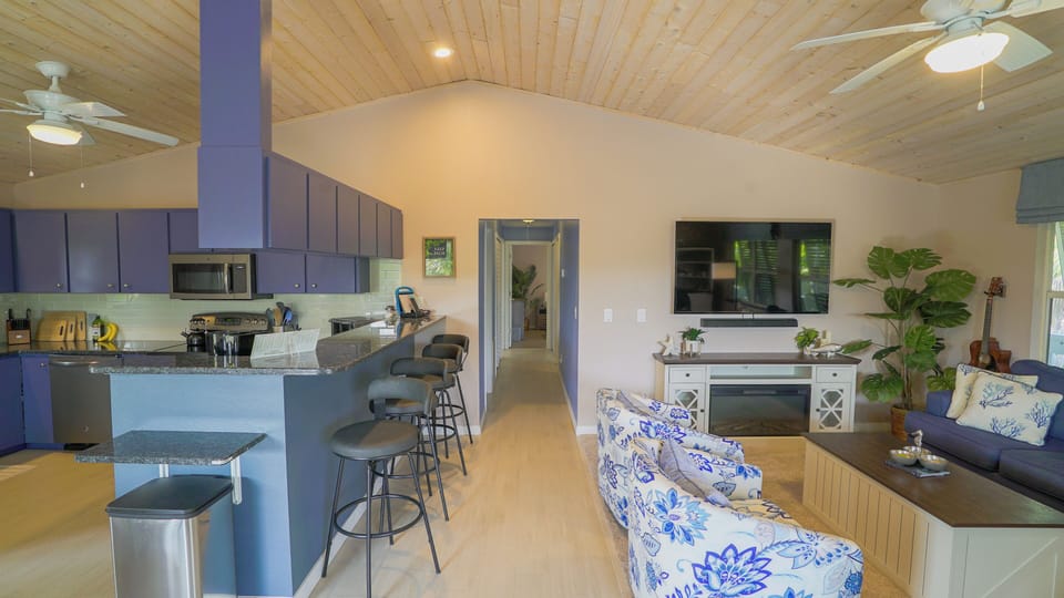 View of living room/kitchen/hallway