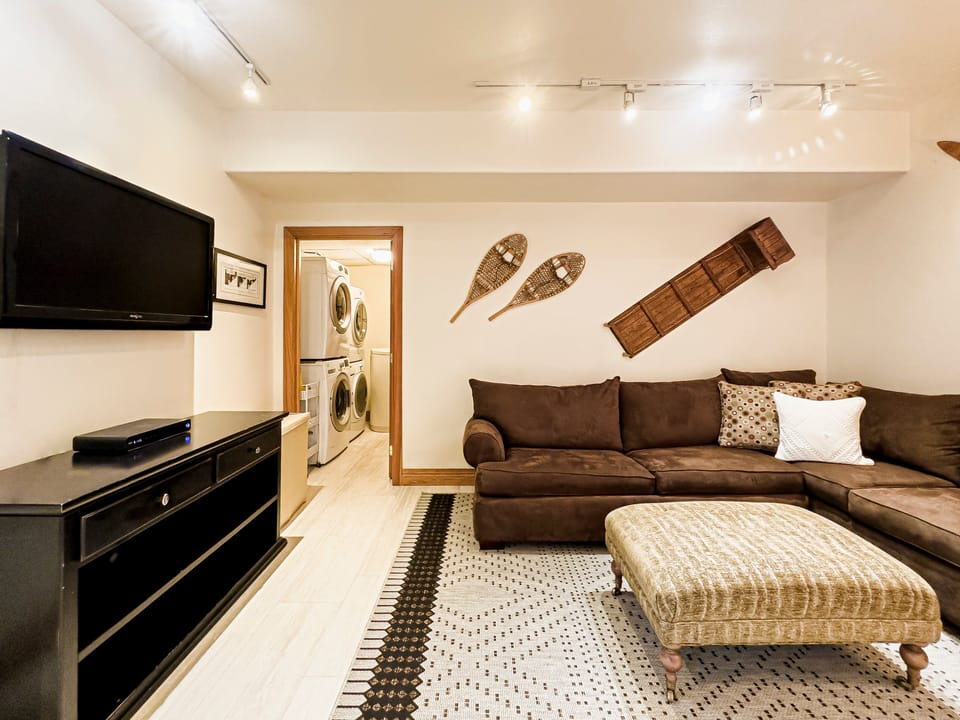 Family room (1st level) with sectional queen sleeper sofa, TV with Roku and cable