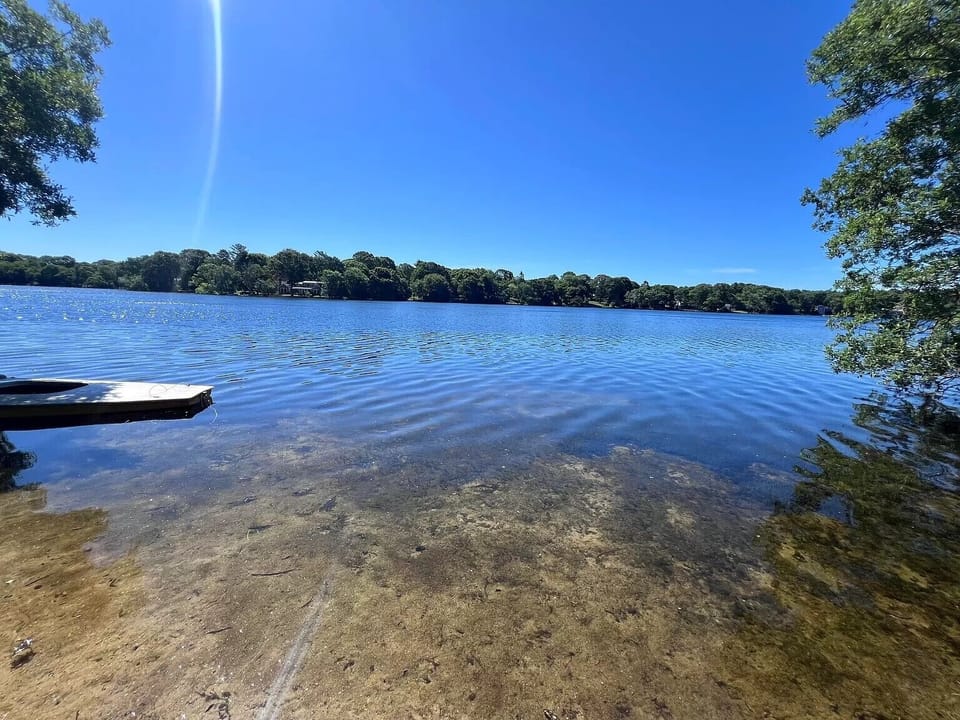 Relax overlooking Long Pond in the beach chairs provided.
