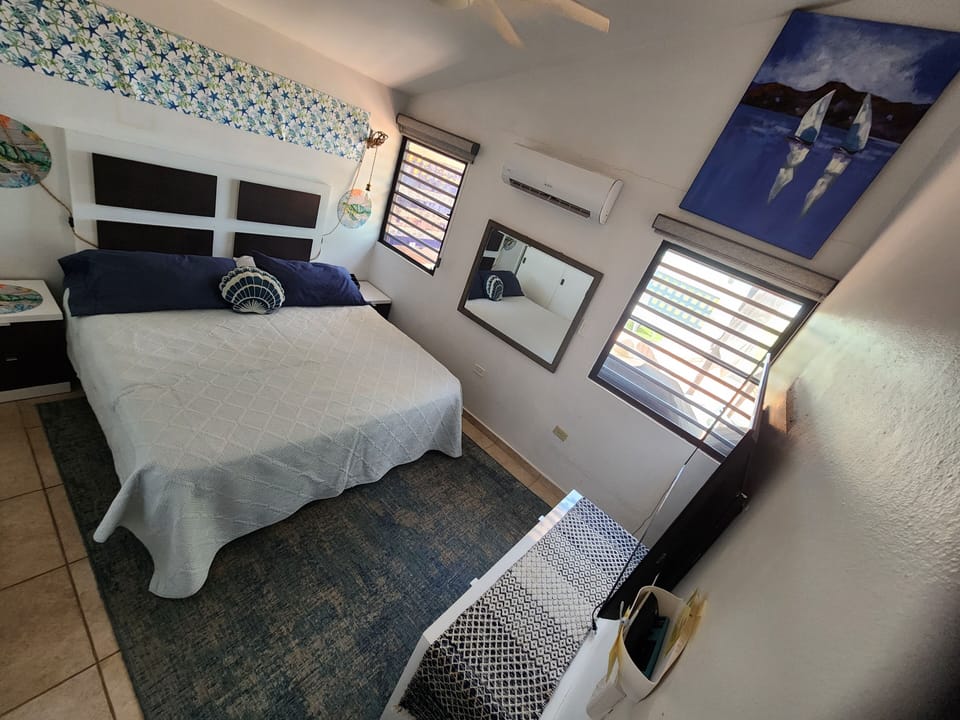Master Bedroom/ Sleep with the Sound of the waves. Has a mini split AC unit.
