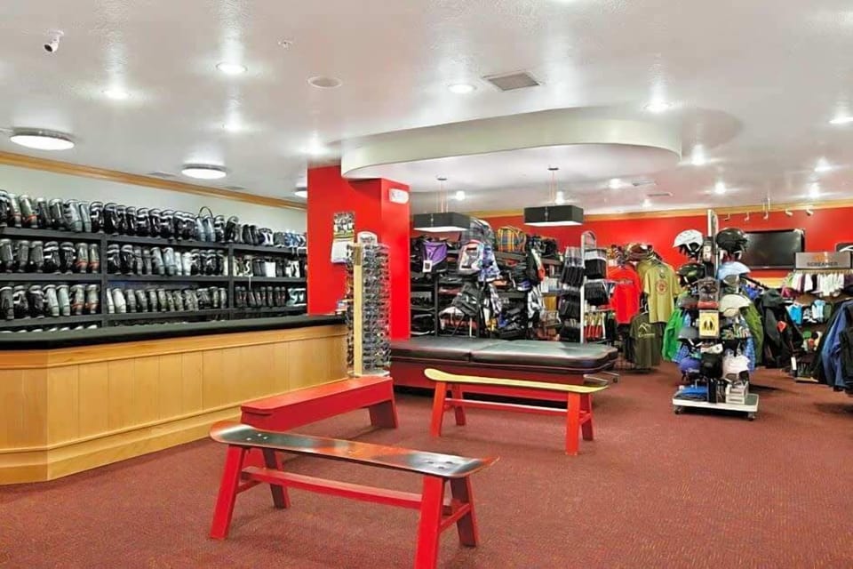 Interior: Ski rental and gear shop located in the building on the ground floor