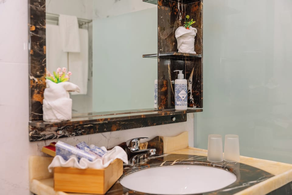 Pamper yourself with stocked amenities and a polished vanity.