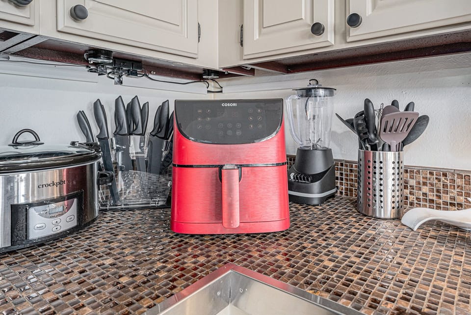 - Make snack time easy with a bright red air fryer, blender, and slow cooker at your fingertips
- Tackle any recipe with a full knife set and modern kitchen tools within reach
- Enjoy a fully equipped setup that’s perfect for home cooked meals and quick bites