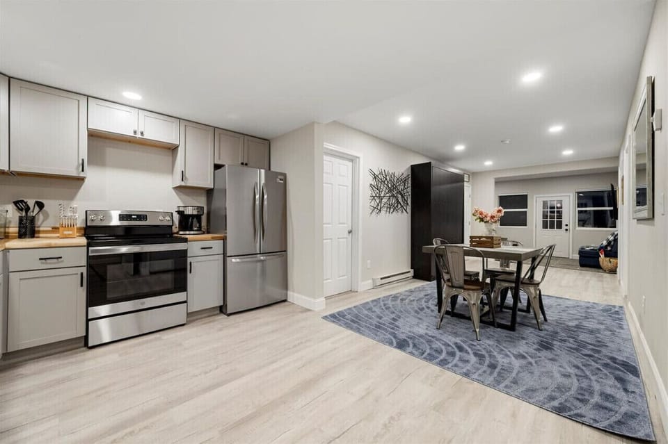 Charming kitchen and dining space, equipped with elegant cabinetry and a cozy dining nook.