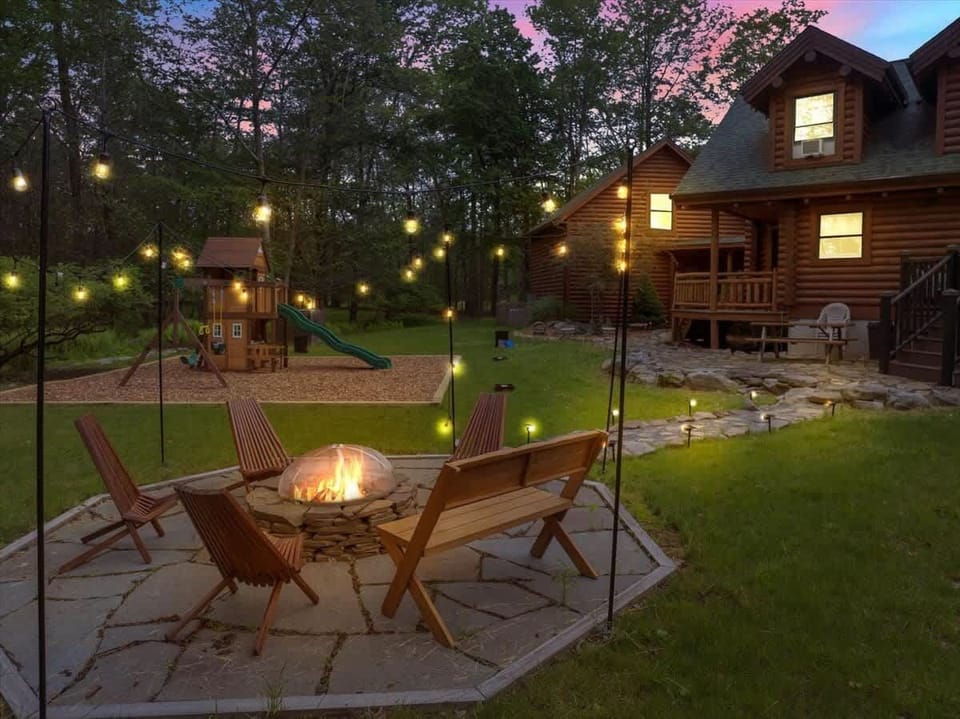 Evening Fire Pit & Outdoor Seating Under String Lights