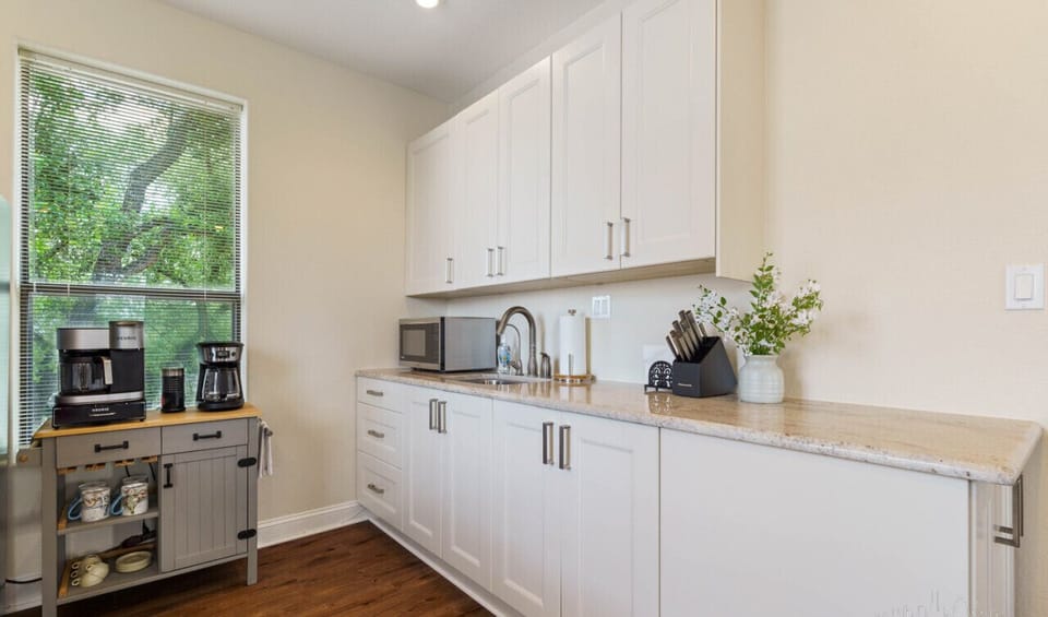 Everything you really need: Kitchenette with dining, microwave, coffee, and the basics