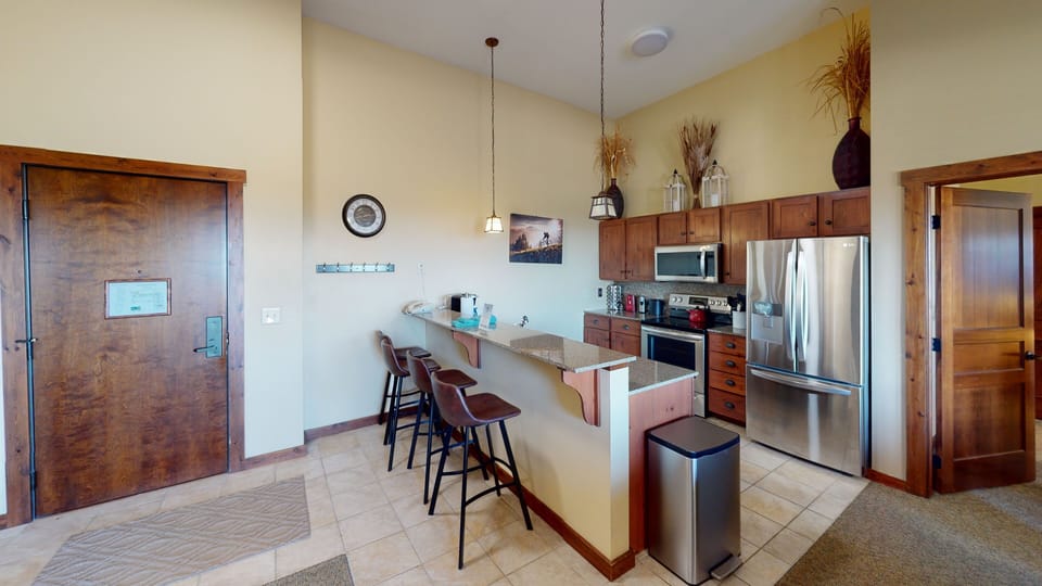 Floor, Indoors, Flooring, Refrigerator, Kitchen