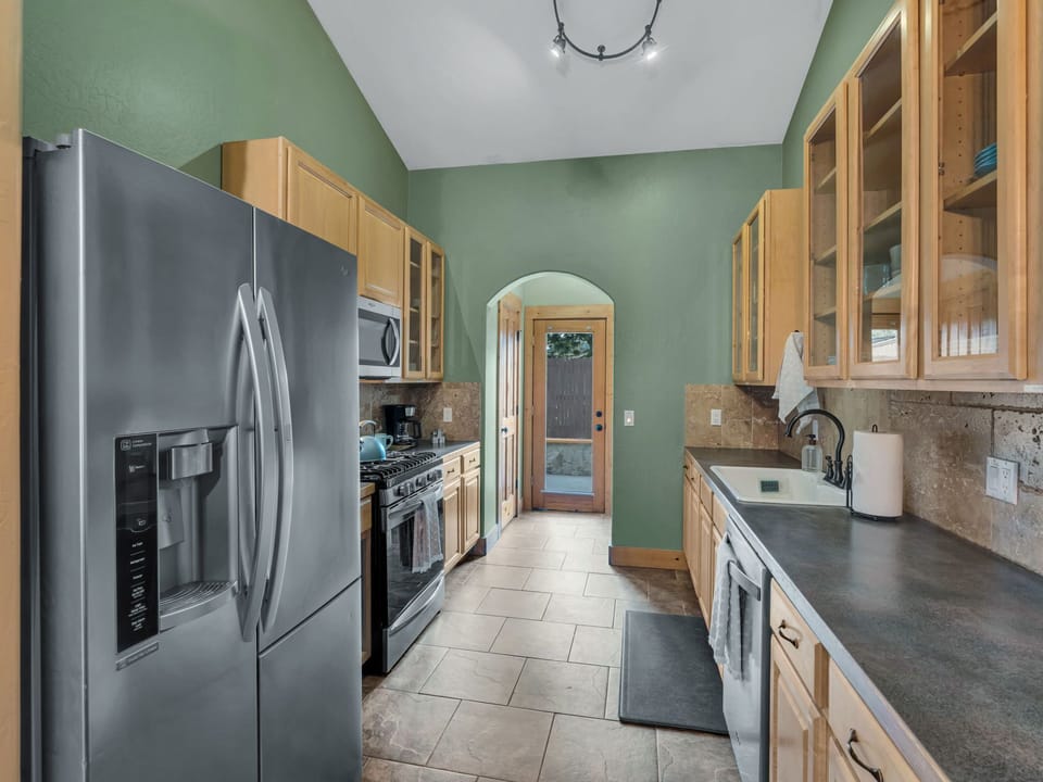 Galley kitchen, equipped with everything you can think of. 