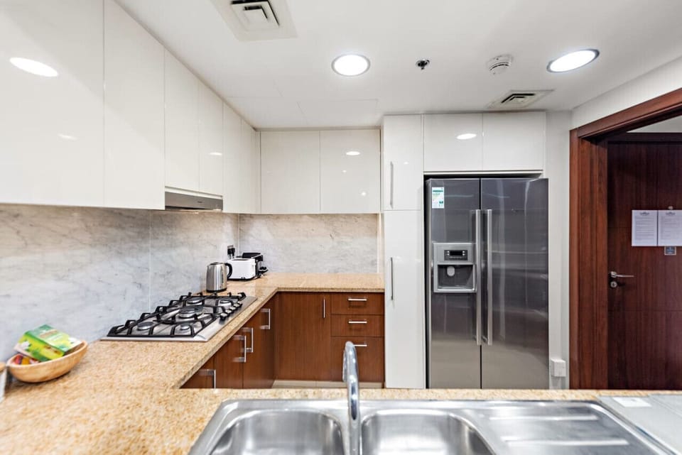 Spacious Kitchen: Cook like a pro in this stylish space with modern appliances and ample counter.